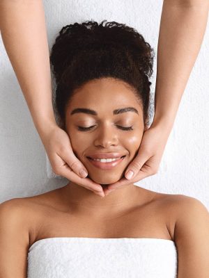 therapist-making-lifting-facial-massage-for-beauti-2022-12-16-06-37-21-utc.jpg
